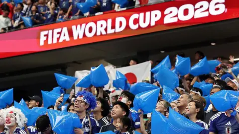 Getty Images Japan fans react in the stands during the FIFA World Cup 2026 Group F match between Netherlands and Japan at Dallas Stadium