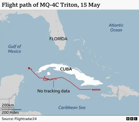 ALT: A map of Cuba, Florida and surrounding areas, a flight path of a MQ-4C Triton on 15 May. The drone flies eastwards in a flight path to the south of Cuba along its entire length. In the west of the island it loops around on itself and then returns back on itself.