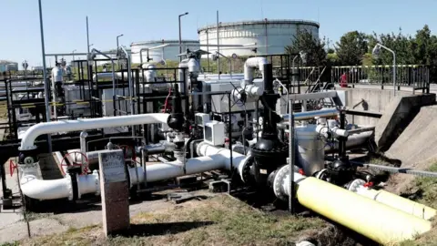 Reuters The Druzhba oil pipeline between Hungary and Russia is seen at the Hungarian MOL Group's Danube Refinery in Szazhalombatta, Hungary, May 18, 2022