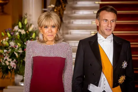 Getty Images Brigitte Macron and Emmanuel Macron attending a gala