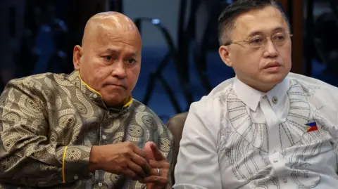 Reuters Philippine senator Ronald Bato Dela Rosa and Bong Go
