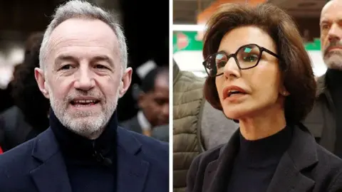 Reuters/BBC/Léa Guedj A man with a white beard and black polar-neck stands on the left and on the right a woman with brown hair and glasses