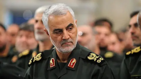 Getty Images A file photo from 2016 showing the late Iranian Quds Force commander Qasem Soleimani wearing military attire.
