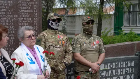 Russian fighters in a Victory ceremony in Rublyovo
