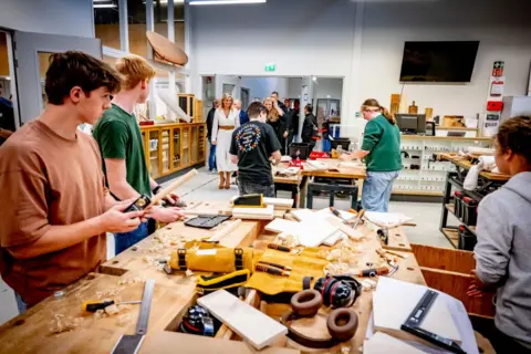 P van Katwijk/Getty Images Queen Máxima of the Netherlands visits the Wood and Furniture college in Rotterdam