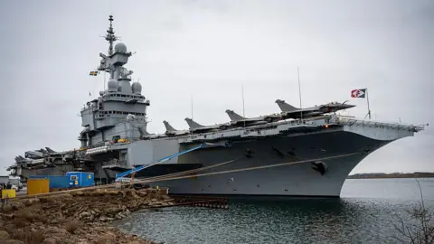 AFP via Getty Images A large ship moored at a quay in Malmo in Sweden