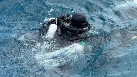 Reuters A diver from Finland takes part in a recovery operation for four missing Italian scuba divers who died in an accident in underwater caves near Vaavu Atoll, Maldives