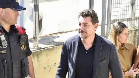 Europa Press via Getty Images Jonathan Andic, the son of Mango's founder, as he leaves the Juzgado de Instruccion 5 in Martorell after paying the one million euro bail