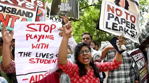 Getty Images AISA members and students protesting against the NEET-UG 2026 scam at Jantar mantar, on May 14, 2026 in New Delhi, India.