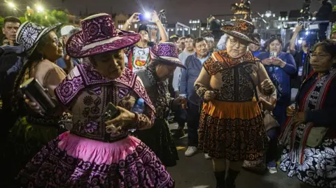 Getty Images Supporters of Roberto Sanchez, presidential candidate for the Together for Peru party, following the runoff election in Lima, Peru