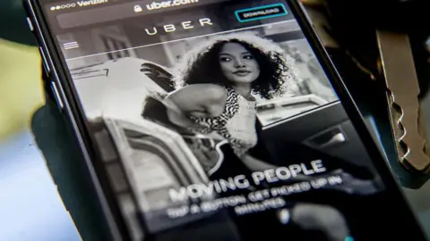 Getty Images An Uber ad displayed on an i-phone