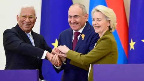 AFP via Getty Images Armenia's Prime Minister Nikol Pashinyan (middle), European Commission President Ursula von der Leyen (right) and European Council President Antonio Costa (left) shake hands during a press conference at the Armenia-European Union summit in Yerevan on May 5, 2026.