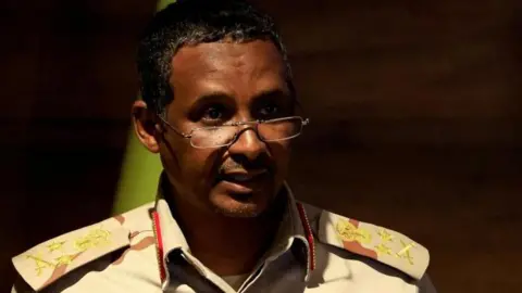Reuters A head and shoulders image of General Mohamed Hamdan Dagalo speaking in Khartoum, Sudan. He is wearing military clothes.