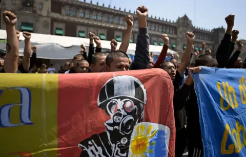 Getty Students take part in a protest over the disappearance of the 43 students of the Ayotzinapa teaching training school in 2014 in front of the Palacio Nacional (National Palace) in Mexico City on March 6, 2024.