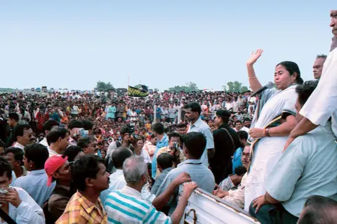 India Today Group via Getty Images Mamta Banerjee, Political Leader Trinamool Congress, addresses rallies farmers against the government land acquisition for Tata Motors, at Singur 