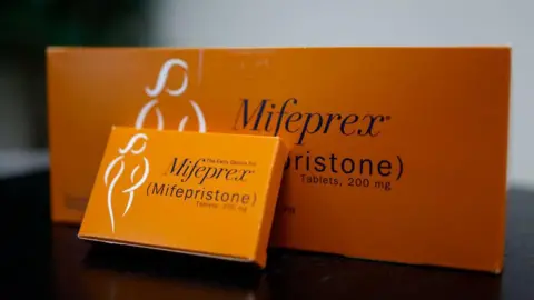 Getty Images In this photo illustration, packages of Mifepristone tablets are displayed at a family planning clinic on April 13, 2023 in Rockville, Maryland