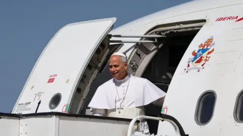 Reuters Pope Leo XIV disembarks the plane at Gando Air Base, during his apostolic journey on the island of Gran Canaria, Spain June 11, 2026