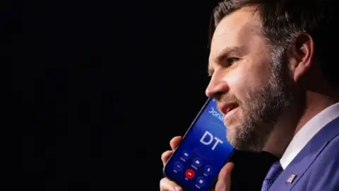 Getty Images JD Vance speaks on the phone with Donald Trump 