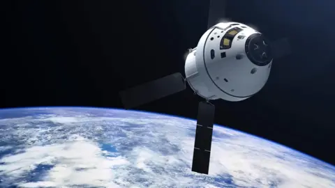 Getty A white, cone‑shaped spacecraft hangs above the bright blue curve of Earth. Its blunt nose faces right, with a dark circular window and small gold‑tinted panes. Four long, narrow black solar panels stick out like a windmill’s arms. Below, Earth is covered in thick white cloud swirls over deep blue ocean, fading into the darkness of space. The top half of the picture is almost entirely black, making the spacecraft and the glowing planet stand out sharply, like a small human‑made lighthouse orbiting a vast, sunlit world.