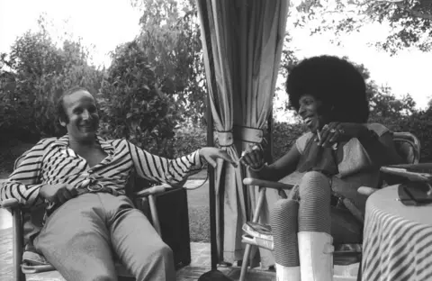 Getty Images Clive Davis and Sly Stone in the 1970s