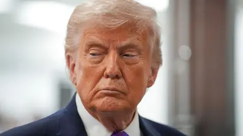 Getty Images close-up of Donald Trump's face, looking off to the side