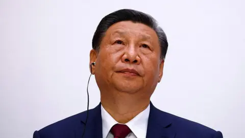 AFP via Getty Images Xi Jinping attends a joint statement with the French president at the Elysee Palace as part of his two-day state visit in France, in Paris, on May 6, 2024.
