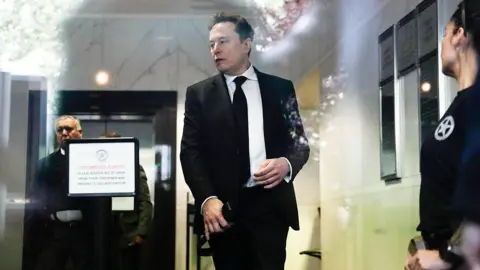 Getty Images Elon Musk arrives for the trial of against OpenAI held at Dellums Federal Building in Oakland, California Tuesday, April 28, 2026. 