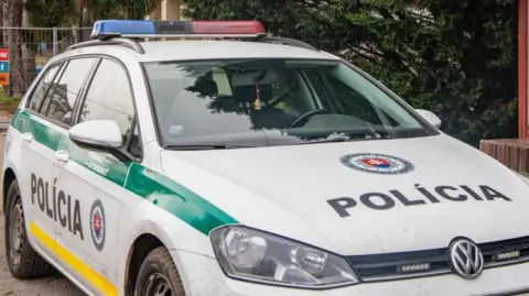 Getty Images Sniffer dogs and specialist units have been deployed across hundreds of schools in Slovakia (file image)