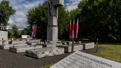 Getty Images A remembrance statue seen during National Day of Remembrance of the Victims of the Genocide of the Citizens of the Polish Republic committed by Ukrainian nationalists during the II World War in today's Western Ukraine held at Wolhynia Square in Warsaw on July 11, 2022