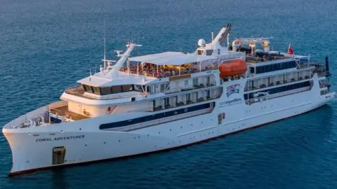 Coral Expeditions a wide angle photograph showing the Coral Adventurer cruise ship.