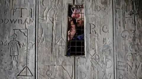 English Heritage The graffiti found on a door at Dover Castle