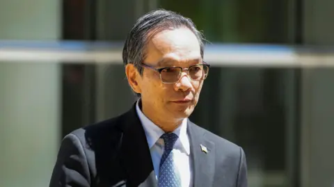 Reuters Lu Jianwang leaves New York court