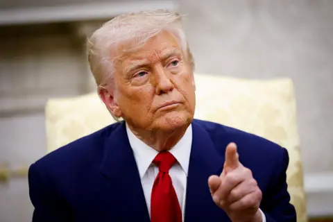 Reuters Donald Trump takes a question from a member of the media during a meeting with Israeli Prime Minister Benjamin Netanyahu in the Oval Office of the White House on 7 April 2025.