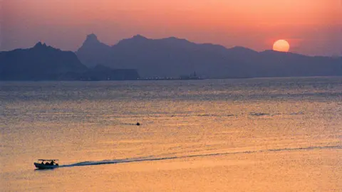Getty Images Sunset over the Gulf of Aden, in 2004.
