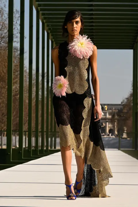 Giovanni Giannoni/WWD via Getty Images Model on the runway at the Dior fashion show as part of Paris Fashion Week Fall 2026 on March 1, 2026 in Paris, France. 