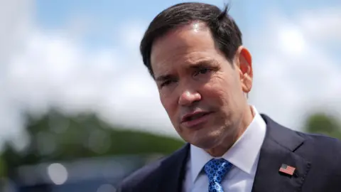 Reuters Rubio speaking to reporters before boarding his plane at Homestead Air Reserve Base, Thursday, May 21, 2026