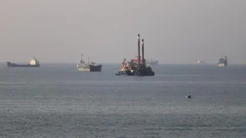 Reuters Six shipping vessels in the Strait of Hormuz near Bandar Abbas, Iran on Monday.