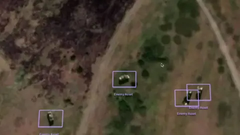 BBC/Palantir A picture showing a satellite image of military vehicles each covered with a purple box labelled "enemy asset".