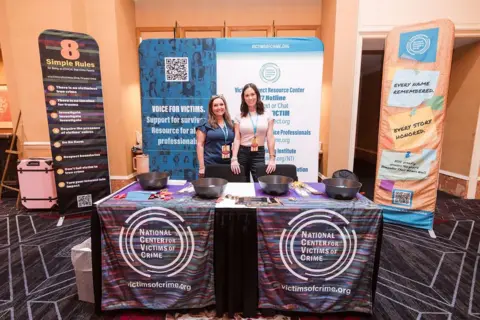 CrimeCon and RenownedPhotos A booth for the National Center for Victims of Crime