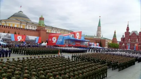Kremlin.ru/Handout via REUTERS Rows of Russian service members take part in a military parade in Moscow's Red Square. 