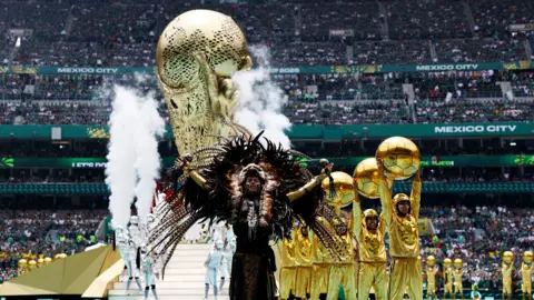 Reuters Performers during the opening ceremony before the match REUTERS
