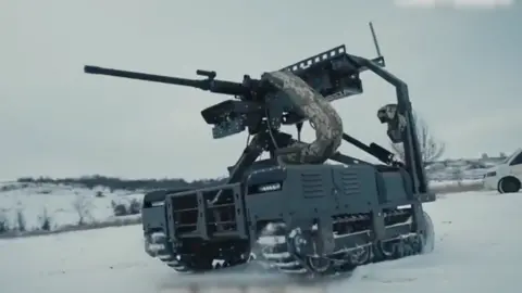 United24 UFORCE land drone - a small tank like vehicle with a large gun on top