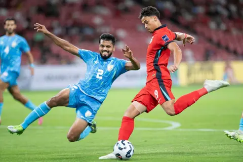 Getty Images SINGAPORE, SINGAPORE - OCTOBER 9: Singapore's Ilhan Fandi vs India's Raful Bheke during the AFC Asian Cup Qualifier third round Group C match between Singapore and India at National Stadium on October 9, 2025 in Singapore. (Photo by Lim Weixiang/Getty Images)