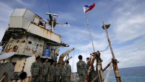 Reuters File photo of members of Philippine Marines on board the BRP Sierra Madre in the Second Thomas Shoal