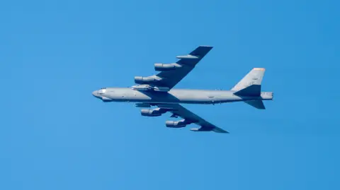 Getty Images File photo of a US B-52 Stratofortress bomber seen in the skies above the UK in March