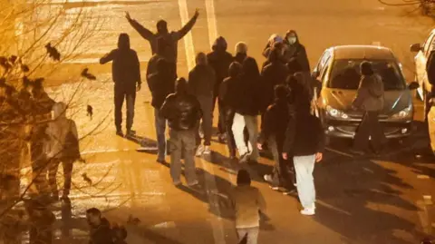 Reuters Iranians protesting on the streets over the collapsing value of its currency and cost of living concerns in January 2026