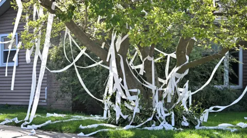 Getty Images A house is littered with toilet paper