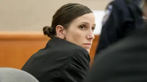 Reuters Kouri Richins, a Utah mother accused of fatally poisoning her husband, looks on during her murder trial at the Summit County Courthouse in Park City, Utah, Monday, Feb 23, 2026