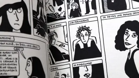 Getty Images Volumes of the "Persepolis" graphic novel series by Marjane Satrapi are seen on June 04, 2026 in Berlin, Germany. Iranian-French author, cartoonist and filmmaker Satrapi, whose series “Persepolis” served for many as an introduction to the daily lives of Iranian citizens amidst the Islamic Revolution, has died at age 56. (Photo by Adam Berry/Getty Images)