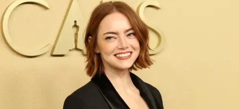 Getty Images Emma Stone attends the 98th Oscar Nominees Luncheon at The Beverly Hilton in February in LA. She is wearing a black jacket.